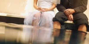 Bride and bridegroom sitting with feet in water !!! SPECIAL PRICE!!! !!! SPECIALE PRIJS !!! !!! PRIX SPECIAL !!! IMAGES USERS WITH CONTRACT PAY FOR THIS IMAGE 60 EURO. USERS WITHOUT CONTRACT PAY THE USUAL SABAM PRICE ACCORDING TO THEIR CATEGORY !! BEELDGEBRUIKERS MET KONTRAKT BETALEN VOOR DIT BEELD 60 EURO. BEELDGEBRUIKERS ZONDER KONTRAKT BETALEN HET GEBRUIKELIJKE SABAM-TARIEF VAN HUN CATEGORIE !! LES UTILISATEURS D' IMAGES AVEC CONTRAT PAIENT POUR CETTE IMAGE 60 EURO. LES UTILISATEURS D' IMAGES SANS CONTRAT PAIENT LE TARIF SABAM USUEL DE LEUR CATEGORIE !!