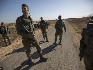 Israeli soldiers patrol near the village of Ma