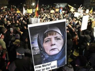 Merkel-migrants.jpg