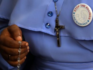 NIGERIA-CATHOLIC-PRAY-STOP-THE-KILLINGS-AFP.jpg
