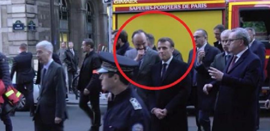 Macron et E. Philippe rigolant devant Notre-Dame en feu